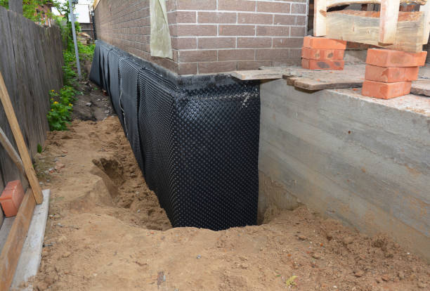 SJ Waterproofing Pros technician performing targeted Foundation Crack Repair assessment in Garrett, WA